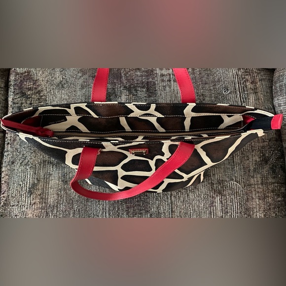 Dooney & Bourke giraffe print tote with red strap. - Picture 11 of 15